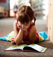 A child reading a kids book - PRC Book Printing